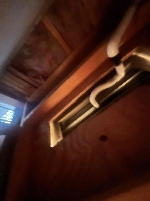 Completed HVAC estimate for replacement of existing Magic Pack heating system. Evaluated current equipment condition, assessed installation location showing exposed framing and ductwork, and reviewed existing thermostat controls to provide comprehensive replacement recommendations for the heating and cooling system.