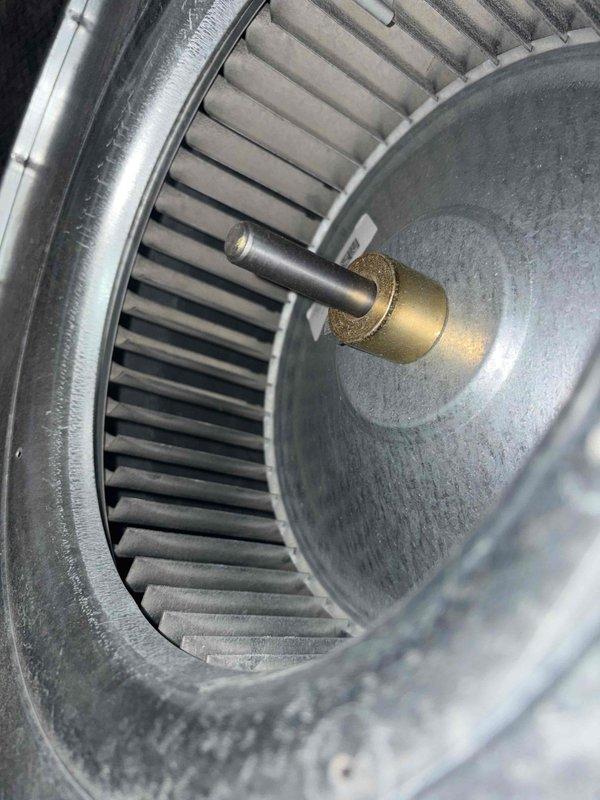 Completed scheduled heating maintenance member visit for air handler system. Performed thorough inspection of blower wheel assembly, noting dust accumulation on blades and housing consistent with normal operation. Verified central shaft and motor coupling components are secure and functioning properly. All system components inspected and found operational within normal parameters.