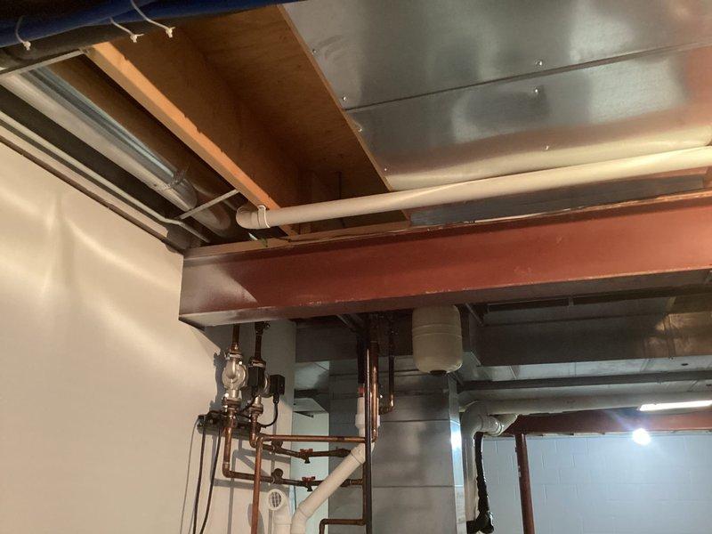 Responded to service call for furnace not heating properly with potential thermostat connectivity issues. Performed diagnostic inspection of residential forced-air heating system, examined internal control components, wiring, and circuit boards with access panel removed. Provided estimate for complete HVAC system replacement including furnace and air conditioning equipment.