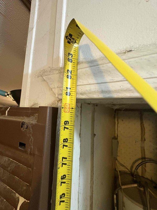Responded to no-heat call on original 1988 furnace in mobile home with suspected failed blower motor. Upon inspection, confirmed system was approximately 38 years old and had reached end of serviceable life. Assessed installation space constraints by measuring utility closet dimensions to determine replacement equipment options. Provided customer with multiple HVAC system replacement proposals suitable for mobile home application and existing space configuration.