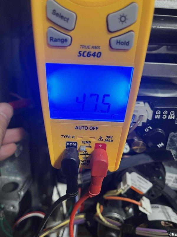 Performed annual heating system maintenance, including inspection of the furnace interior, wiring, and control module connections. Used a true RMS clamp meter to test electrical components, measuring resistance (47.5 Ω) and AC current draw (0.49 A) to verify proper operation. No frost, rust, or visible damage was found, and the system was left operating within normal electrical parameters.