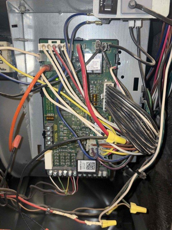 Performed scheduled heating maintenance, including inspection of the integrated furnace control board, low-voltage wiring, and splice connections, and visual inspection of the blower assembly. Noted accumulated dust and debris on the blower wheel blades and dense, tangled wiring with taped wire-nut splices in the control cabinet, which may warrant further evaluation or cleaning to maintain airflow and reliable system operation.