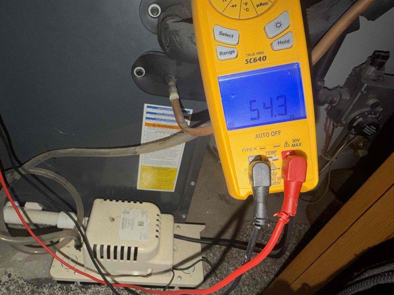Performed scheduled club-visit maintenance on the gas furnace, including measurement of supply and return air temperatures with a digital probe thermometer and electrical diagnostics using a true RMS clamp meter to verify component amperage draw. Inspected the air handler cabinet, gas valve, condensate pump, and associated drain piping, finding no visible damage, corrosion, or leaks, and confirmed the system was operating within normal parameters at completion.