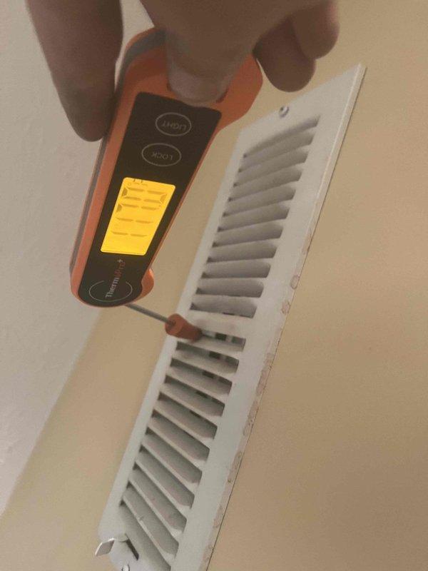 Installed a complete Napoleon package system serving the second floor, transporting the equipment with a power dolly and additional manpower for safe handling up and down. Mounted a thermostat on the exterior wall within the return air space and verified system operation by measuring supply air temperature at the register with a probe thermometer. Equipment was positioned in the crawl space, with the surrounding area inspected for proper clearance and clean routing of lines.