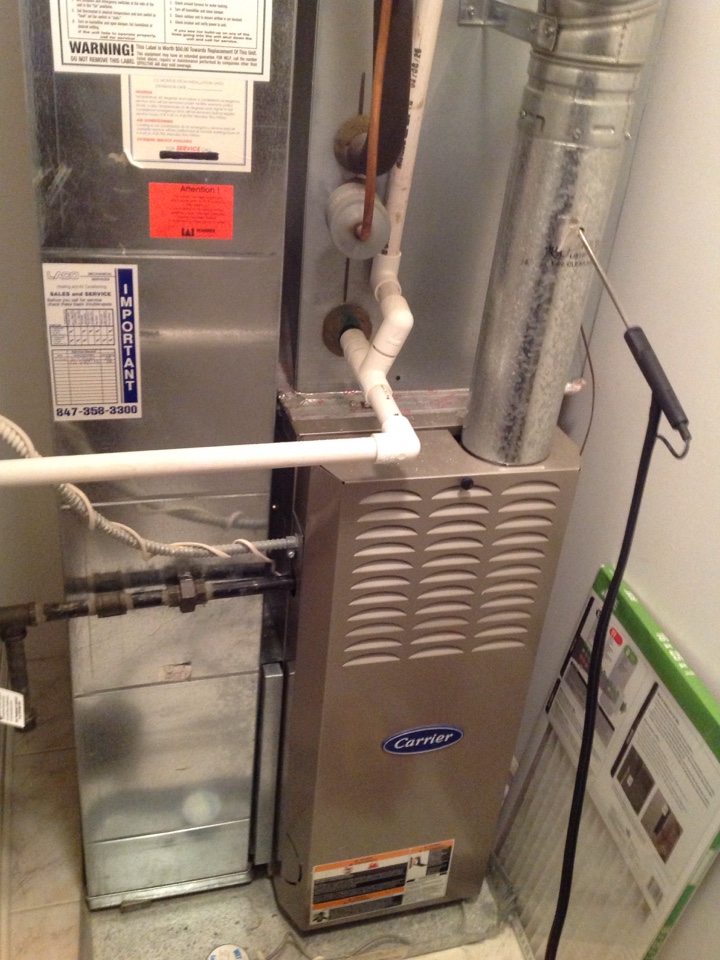 Annual heating maintenance on residential Carrier furnace in Northbrook