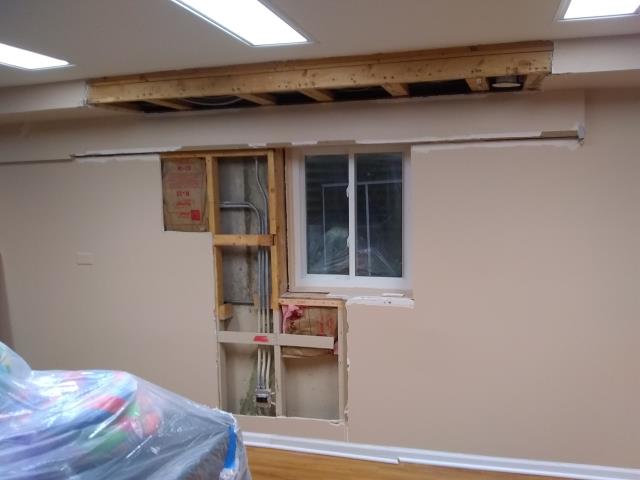 Northbrook, IL - Drywall and insulation was removed after dishwasher leak. Northbrook, IL - Drywall and insulation was removed after dishwasher leak.