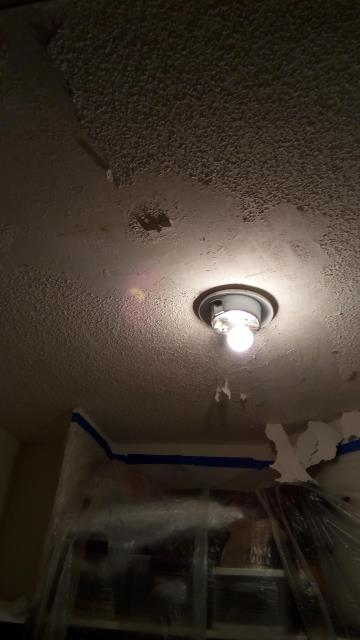 Glenview, IL - Pop corn ceiling in the closet was damaged by water leak from above. Glenview, IL - Pop corn ceiling in the closet was damaged by water leak from above.