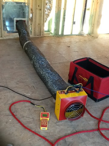 Duct tightness testing on new construction home to meet 2009 IECC duct leakage standards. 
