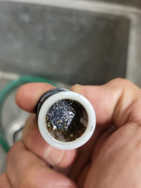 Responded to the Salon for units receiving cloudy water on hot and cold sides. Disconnected three (3) tankless units and cleaned all filters within the unit. Found dirt residue inside of all three filters only. I inspected Target and America's Best within the strip mall to determine the clarity of their water. Both stores are experiencing cloudy water as well. I inspected Rack Room Shoe and Bath & Body Works to determine the clarity of their water. Both stores are experiencing clear water. I ran water for several hours in an attempt to clear up the cloudy water the Salon is experiencing. Since a few stores within the shopping center are not experiencing the cloudy water, the issue could've cleared up with flushing the water out. After several hours of constantly running water, the water did not clear up however. At this point, recommend customer contact Landlord to contact City/County. This may be related to work they are/have performed.