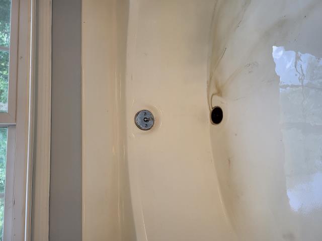 Responded to customer's home because the garbage disposal had fallen off the drain and was laying on the customer's cabinet floor. We found the garbage disposal had come apart from the attachment to the sink. We were able to properly reinstall the garbage disposal to resolve the issue without replumbing or replacing the garbage disposal. While on site, we also evaluated a slow drain in the bathtub. We were able to snake the tub drain to clear the stoppage and resolve all issues. 