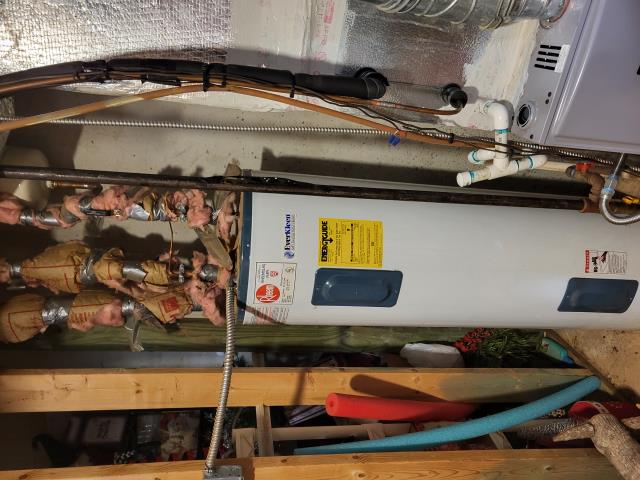 Our customer had contacted us to discuss replacing their current 50 gallon electric water heater. The current water heater is 20 years old. They are also having an issue with no water pressure from the tub faucet. No other faucet in the home is having this issue. After discussing multiple options, we recommended replacing the water heater first before deciding on the faucet repair as replacing the water heater may fix this issue. Since the tub faucet releases the most volume of water, it could simply be that the sediment from the old water heater is causing a blockage on the tub faucet. We arrived today to perform this work. We removed customer's existing water heater and installed a new Rheem 50 gallon electric water heater with a new cold water shut off valve and a new thermal expansion tank. Once the new water heater was installed, the tub faucet was no longer providing little to no pressure, it was working properly as should. 