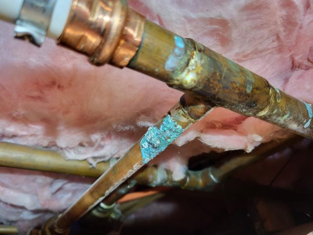Responded to customer's home for a leak in the ceiling. Once on site, we found where the pex water line transition into copper piping is leaking at the copper pipe. We cut out and removed the leaking section of copper pipe and installed a new section of pex water line to resolve the issue. Responded to customer's home for a leak in the ceiling. Once on site, we found where the pex water line transition into copper piping is leaking at the copper pipe. We cut out and removed the leaking section of copper pipe and installed a new section of pex water line to resolve the issue.