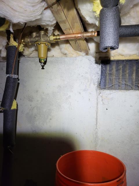 Responded to customers home for a whistling nose coming from the pipes in high water pressure from the fixtures. After evaluation, we determined there is a whistling noise when water is ran but mostly the noise is coming from the master bathroom. After investigating, we found the pressure reducing valve directly underneath the master bathroom where the whistling is coming from. There's also a thermal expansion tank at the water heater as well as an older expansion tank near the pressure reducing valve. The second thermal expansion tank is unnecessary. We will cut it out and cap the water line. Still determined high pressure from inoperable pressure reducing valve (PRV). We removed the existing PRV and furnished and installed a pressure regulator valve to resolve all issues.