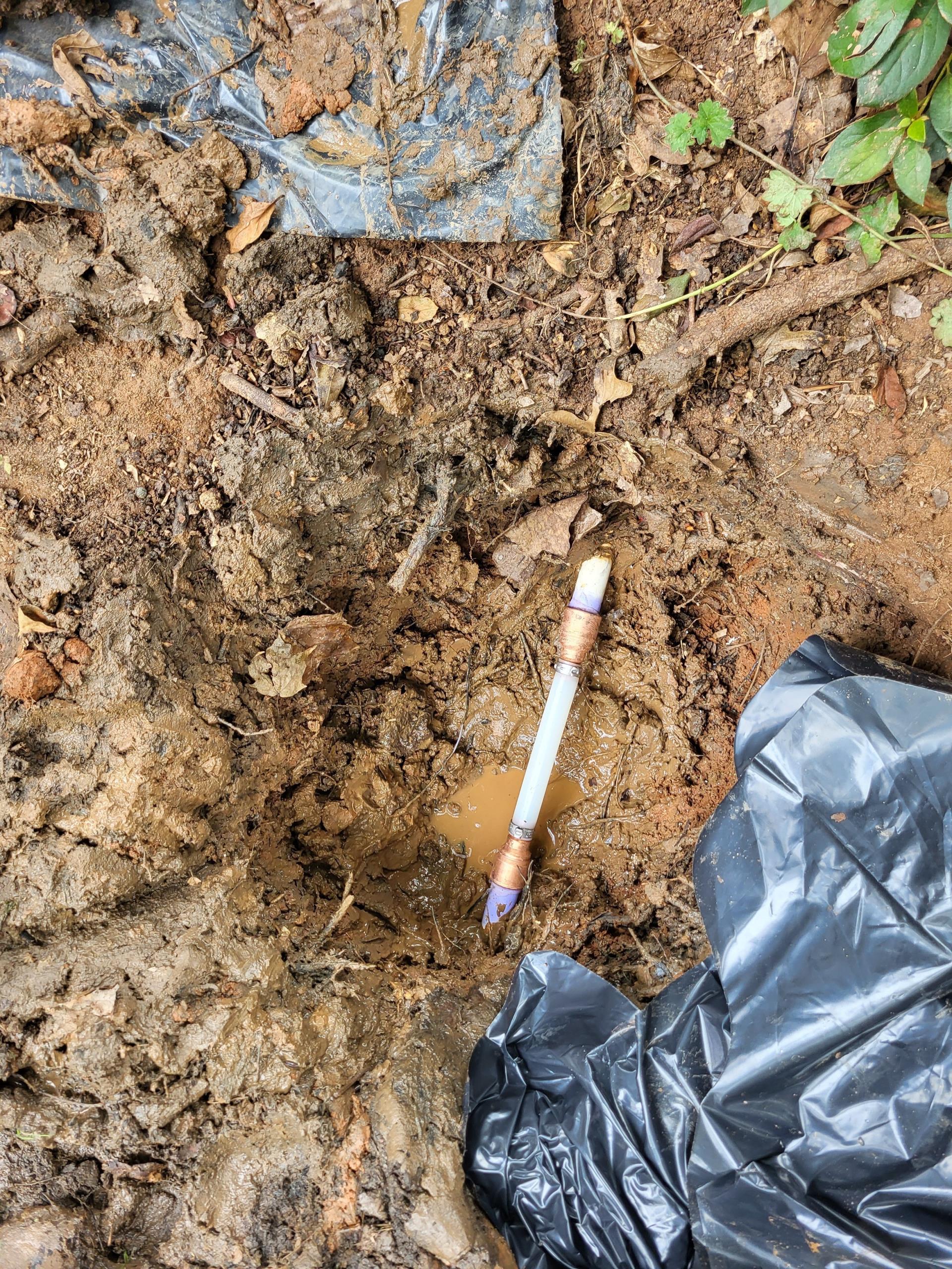 We responded to our customer after they noticed water running through the yard from the direction of the meter. Upon arrival, we confirmed the water meter was spinning even with all the fixtures inside turned off, dug along the service line to locate the source and found a section of pipe that had cracked and was leaking underground. We cut out the damaged portion of the pipe and repaired it. Once the glue had dried, we turned the water back on and checked the repair for leaks.

