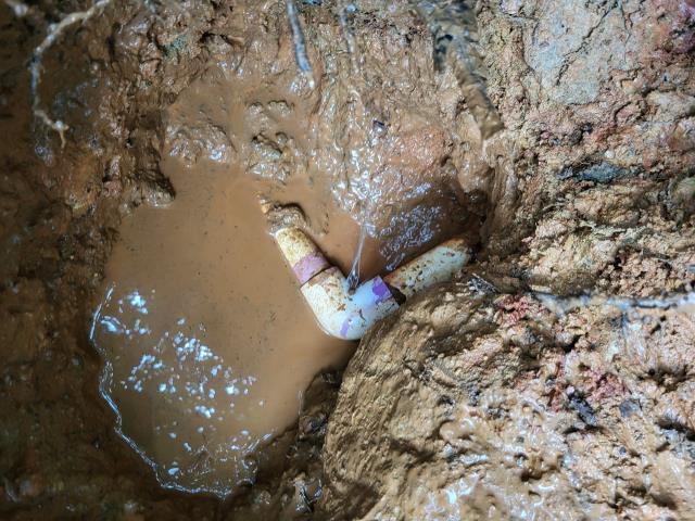 Our customer accepted our plumbing quote to repair a underground PVC water line leak in the yard. Once onsite, we dug down and found a broken elbow fitting. We replaced the damaged pipe and sealed it with glue and primer. After glued dried we tested for any possible leaks.

