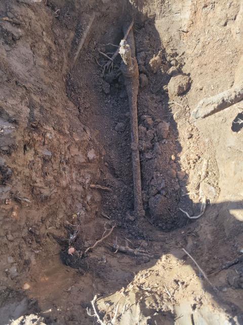 We responded to our customer due to repairs and upgrades on the irrigation system. Once onsite, we located the service line and dug down to access and replace the main shut off valve that was no longer working properly. Once the new valve was installed, we also installed a backflow prevention device. Once installation was complete, we ran a test for leak free operation. To provide long term protection and easy access, we installed two metal valve boxes around the shut off and backflow device. After everything was completed, we backfilled and buried the hole.
