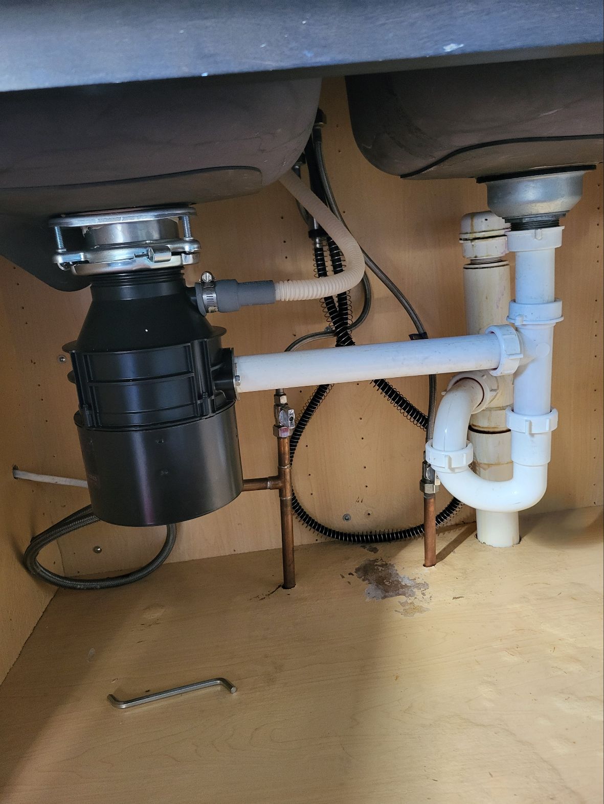 We were called out to our customers home due to replacing their existing garbage disposal with a new customer supplied unit. Once on site, we removed the old garbage disposal assembly, prepped the flange and drain connection and installed the new customer supplied garbage disposal. After install was complete, we ran water and operated the disposal to confirm proper function and leak free operation.
 We were called out to our customers home due to replacing their existing garbage disposal with a new customer supplied unit. Once on site, we removed the old garbage disposal assembly, prepped the flange and drain connection and installed the new customer supplied garbage disposal. After install was complete, we ran water and operated the disposal to confirm proper function and leak free operation.