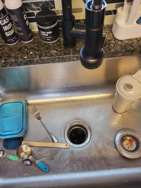 We responded to our customer after they noticed their garbage disposal was humming but not grinding, indicating the blades were jammed. Upon inspection, we confirmed the blades were stuck and unable to rotate freely. We manually turned the blades to dislodge the obstruction, then ran water and tested the disposal. Once cleared, the unit powered on and is operating smoothly.




