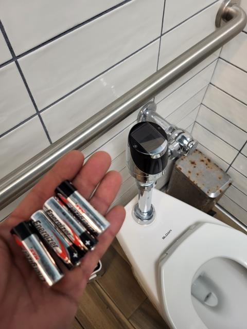 We responded to our customer after they noticed one of their automatic flush valves was not activating properly after use. Upon inspection, we replaced both batteries in both flush valves and tested their operation. One valve began working correctly, while the other showed visible corrosion around the electrical connections. The corrosion is preventing the manual flush from functioning as intended. We informed our customer of the issue and discussed repair or replacement options to restore full functionality.  

