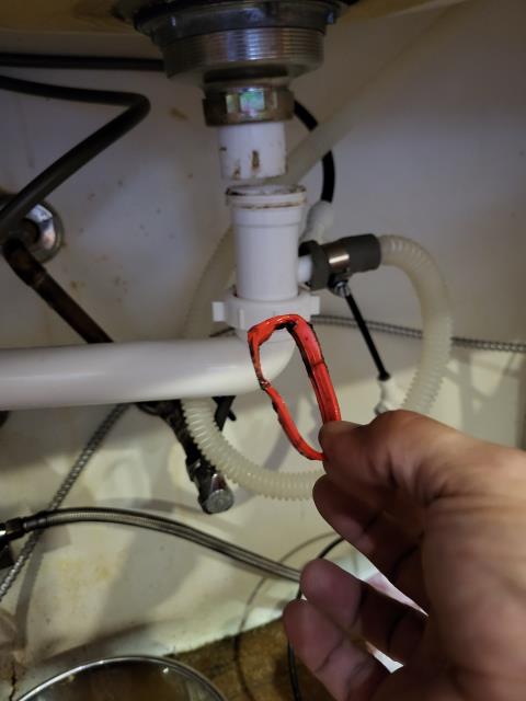 We responded to our customer when they noticed signs of a possible garbage disposal leak underneath kitchen sink . Upon arrival, to locate the source, we ran water through the line and inspected all visible plumbing connections. During our inspection, we found that the washer on a PVC pipe fitting had deteriorated and was no longer sealing the joint properly. We removed the old worn down washer and replaced it with a brand one. After completing the repair, we ran a full water test to check for nay additional leaks or drips.