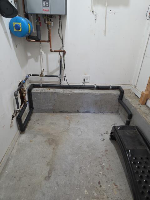 We responded to our customer to reroute the home's main water line service for improved access and functionality. The existing line was relocated from the meter to the back side of the house, then extended into back room of the garage, where it was tied back into the existing interior water line. Once on site, we excavated a trench from the meter to the new entry point at the rear end of the property and installed a new water service line using durable piping. Once inside the structure, we extended the new piping into the back room of the garage, where we reconnected it to the existing interior water line. After restoring water service, we verified proper flow, pressure, and operation throughout the home.