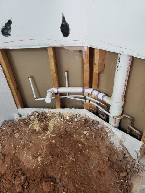 We responded to our customers home to complete a full plumbing rough in as part of their bathroom remodel, which required relocating several fixtures to fit the new layout. Once on site, we began by removing the existing lavatory and rerouting the drain and supply lines approximately two feet to match the new vanity location. We then relocate the shower drain and repositioned the P-trap so it would properly line up with the new shower base. The toilet rough in also needed to be shifted about six feet to accommodate the redesigned floor plan, so we installed the closet bend piping and secured the new flange location. All drain, waste, and vent connection were fitted, glued, and checked for proper alignment. Once the rough in adjustments were complete, we pressurized the supply lines and ran water through the drains to verify leak free operation. 
