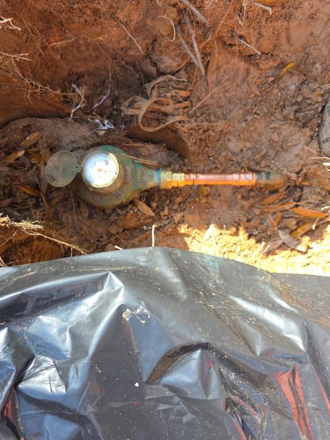 We were called out to inspect a water leak at the meter and found the issue was coming from a damaged copper water line connected to the service. Upon arrival, after exposing the area, we located the compromised section of copper piping that was allowing water to escape. We cut out the damaged portion and installed a new section of copper pipe, securing all the fittings and connections to ensure a long lasting repair. Once the repair was complete, we restored water pressure and tested the line for leaks at the meter and along the nearby service line.