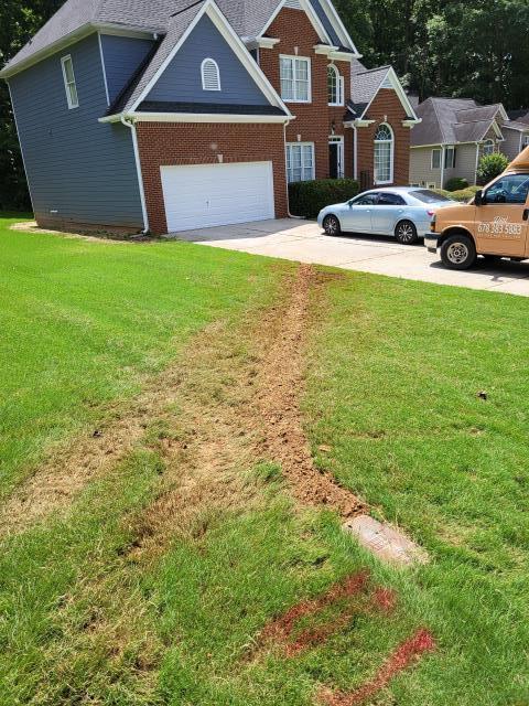 Responded to customer's home for water pouring from the driveway. Once on site, found that customer's existing water line runs under the driveway and is leaking under the driveway. We provided options to customer to cut and remove the concrete driveway to repair the water line as well as replace the current water line but reroute the new water line so that it would no longer run under the driveway. Customer opted to replace the current exterior water line and reroute so it's no longer under the driveway. We arrived today to perform this work. We installed a new water line from the meter to the home without going under the driveway. Once installation was complete, we tested for proper leak free operation. 