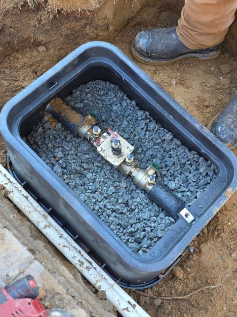 We responded to our customer to our customer to add a new irrigation connection connection to the homes water main to properly supply their lawn sprinkler system. From our main water supply line, we installed a dedicated tie in and added a double check valve backflow preventer to protect the homes drinking water from potential cross contamination. This setup ensures proper water pressure, safe operation, and full code compliant backflow protection for the irrigation system. All the connections were secured, sealed, and supported for future leaks or line stress. Once installation was complete, we thoroughly tested the system for leak free performance and verified correct flow to the irrigation zones. 