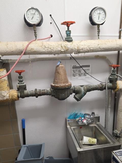 We responded to our customer Country Club Of The South Tennis Center due to issues with inconsistent water pressure affecting the facility. After evaluating the incoming water service, we determined that the existing 2" commercial pressure reducing valve was failing to properly regulate and maintain safe, steady water pressure throughout the building. We removed the outdated regulator and installed a new 2" commercial grade pressure reducing valve designed to handle the higher demand of multi fixture athletic facility. All connections were secured and tightened to code, and we performed a full pressure test to ensure the system was operating at optimal and consistent levels.