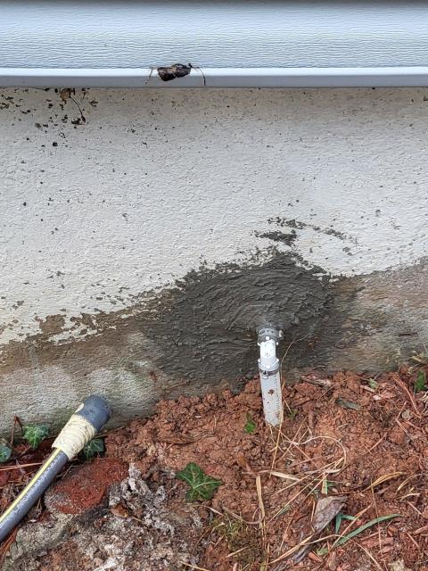 We responded to our customers home after a leak was discovered in the main water line at the foundation wall. Once on site, we inspected the area and confirmed the pipe was leaking where it passed through the concrete. We shut off the main water supply and cut out the damaged section of the pipe going through the foundation. A new section of water line was installed and securely reconnected to restore proper flow. After completing the repair, we turned the water back on and tested the line to ensure it was leak free. To finish the job, we sealed the foundation penetration with hydraulic cement to help prevent future water intrusion.