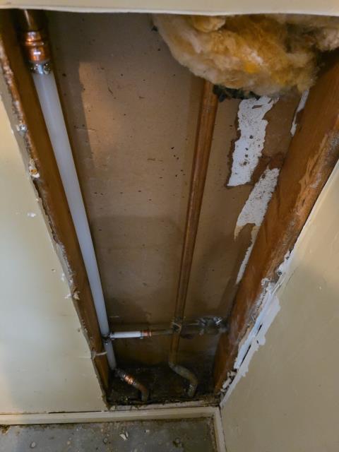 We responded to our customer after they noticed water leaking around the water heater. Upon inspection, we found a pinhole leak in the copper piping located behind the water heater. The water supply was shut off to prevent further damage while the affected section of pipe was accessed. We repaired the damaged copper line using proper fittings and secure connections. Once the repair was completed, the water was turned back on and the line was fully pressurized. We inspected the repaired area and surrounding piping to confirm leak-free operation. The system is now functioning properly with no signs of additional leaks.
