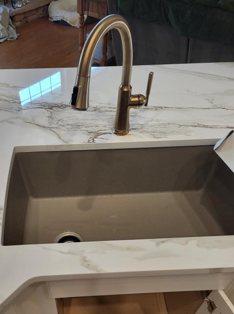 We responded to our customer to install a new kitchen faucet and garbage disposal as well as reconfigure the existing drain lines due to the existing fixtures being outdated and not functioning properly. Once on site, we removed the old components and mounted the new kitchen faucet and connected the water supply lines. We then installed the new disposal and ensured it was properly aligned and supported. The drain piping was reworked to create correct flow, proper slope, and a secure connection to the disposal. All fittings and connections were tightened and sealed to prevent future leaks. Once the installation was completed, we ran water through the system and tested the faucet, disposal and drain lines. Everything is now operating properly and is leak free.