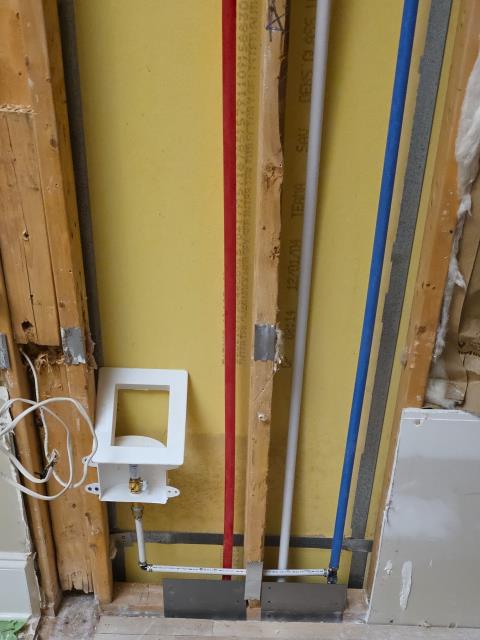 We arrived today to assist with our customers kitchen remodel, which required rerouting several plumbing lines to match the new layout. We relocated the existing 2 inch PVC kitchen drain line approximately 10 feet to its new location. The hot and cold water supply lines were also moved about 10 feet to properly serve the new fixture locations. To complete this work, we cut the necessary sections of sheetrock in both the kitchen and garage ceilings. We rerouted three 3/4 inch copper water lines from the kitchen ceiling into the garage ceiling for better access and routing. New PEX piping was installed, including approximately 25 feet each for hot and cold water lines and about 35 feet for the recirculation line. Stud guards were added for pipe protection, and all lines were tested to ensure proper flow and leak free operation.