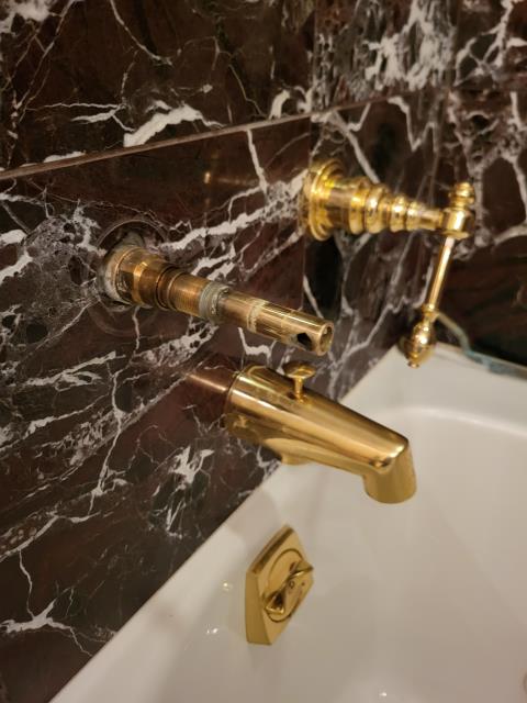 We responded to our customer to install a Moen Flo water monitoring system and automatic shut off valve to help protect their home from water damage and hidden leaks. The system was installed on the main water line, all connections were secured, and the device was connected to our customers network so they can monitor usage and receive alerts in real time.  While on site, we also discovered a gas leak in the brick wall feeding the indoor grill. To resolve this issue, we ran approximately five feet of new trac pipe through the access panel in the garage, installed a new shut off valve there, and connected it to the stove using a gas whip, leaving the existing basement valve in place for added safety. Once the gas work was completed, we performed leak testing. During our inspection, we found a leak in the guest bathroom bathtub valve, likely caused by a failing cartridge. We gave our customer a detailed estimate for the necessary repairs and will return once part arrives.