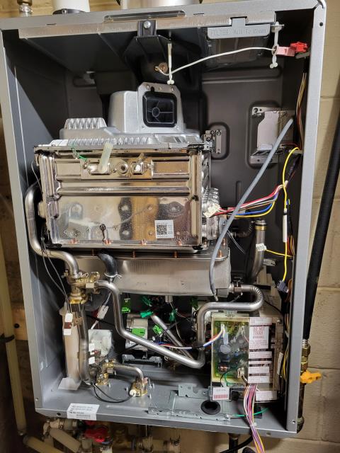 We responded to our customer after they noticed their tankless water heater was making a beeping noise. Once on site, we inspected the unit and confirmed it needed internal service to correct the issue. We disassembled the tankless water heater to access the components inside. We then replaced the burner plate assembly and installed new gaskets to ensure a proper seal and reliable operation. After the new parts were installed, we reassembled the unit and restored power and water service. Once everything was put back together, we tested the system for for proper performance and leak free operation. The tankless water heater is now  running correctly and the beeping issue has been resolved.  