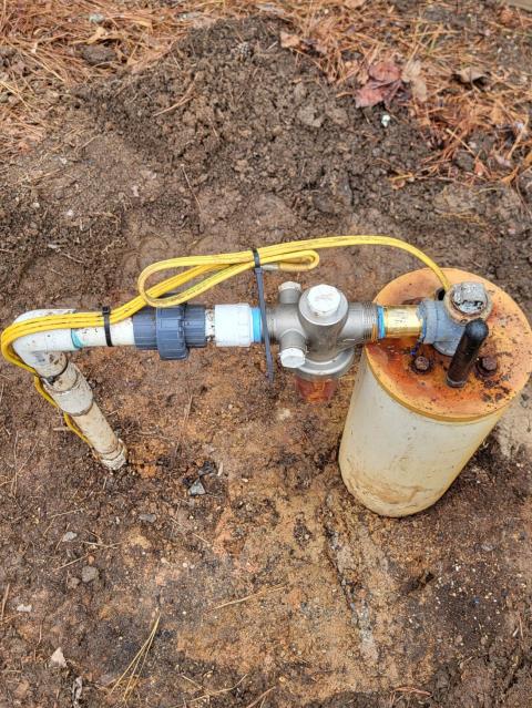 We responded to our customer after they noticed a water leak near their well system, which can quickly lead to water loss and pressure issues if not repaired. Upon arrival, we inspected the well and found a leaking pipe at the well connection that was allowing water to escape. Leaks at the well are common as fittings and piping age or shift over time. We cut out the damaged section of pipe and installed a new section to create a secure, long term repair. Once the repair was completed, we restored water service and tested the well system for leaks. Everything held properly with no signs of dripping or pressure loss. The well water line is now sealed and operating correctly.