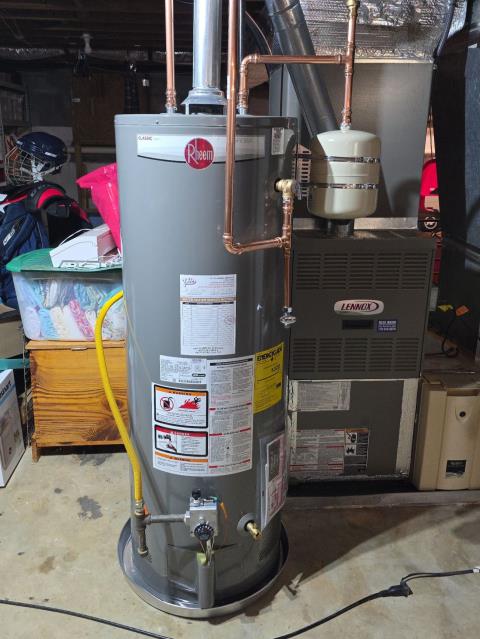 We responded to our customers home after they reported no hot water in the home, which is often a sign of a failing water heater. Upon arrival, we inspected the existing unit in the basement and determined the unit was failing due to age. We discussed water heater options with our customer, based on their needs, they decided to move forward with a new Rheem 50 gallon gas water heater for reliable hot water and improved performance. We removed the old water heater and installed the new Rheem gas water heater, ensuring all gas, water, and vent connections met current code requirements. Once installation was complete, we filled the tank, restored gas service, and tested the system. 