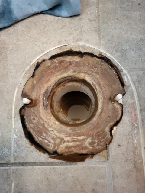 We responded to our customer in Woodstock, GA after they reported their toilet was backing up and not draining properly. Upon arrival, we inspected the fixture and determined there was a blockage in the sewer line beneath the toilet preventing normal flow. To properly access the drain, we removed the toilet so we could reach the sewer pipe directly. We then cleared the blockage from the drain line using professional drain cleaning equipment. Once the obstruction was removed, we ran water multiple times to ensure the line was flowing freely with no backups. After confirming proper drainage, we reinstalled the toilet securely. 