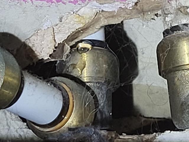 We responded to our customer in Kennesaw, GA after they reported a water leak caused by a pinhole leak. Upon inspection, we found a SharkBite fitting that was not installed properly and was leaking. To resolve the issue, we removed the faulty fitting and replaced it with proper PEX fittings for a secure connection. After completing the repair, we tested the line and confirmed it was leak free.