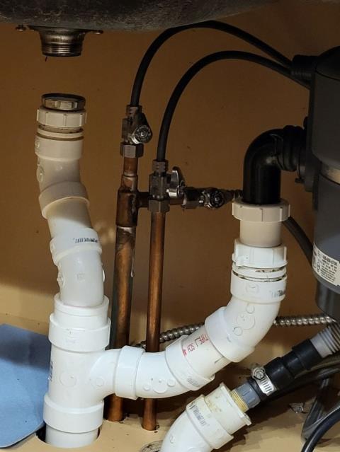 We responded to our customer in Roswell, GA after they reported a kitchen sink that was not draining properly. To access the blockage, we disconnected the drain pipes under the kitchen sink and snaked the line to remove the obstruction. After clearing the clog, we filled the sink and ran water to confirm proper drainage. The sink is now draining freely and operating as it should.