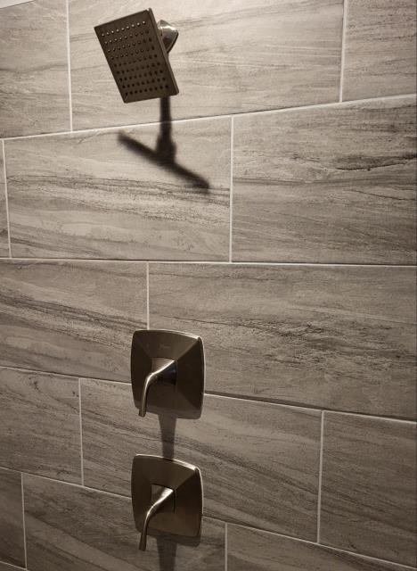 We responded to our customer in Powder Springs, GA after they reported issues with the rain shower head in the master bathroom. Upon inspection, we found the cartridge needed to be replaced to restore proper water control and stop leaking. We installed a new cartridge for the rain head and ensured all internal components were seated correctly. We also caulked the trim plate to prevent water from getting behind the wall. After completing the repair, we tested the shower for proper operation and leak free performance. The rain shower is now functioning properly with no leaks.