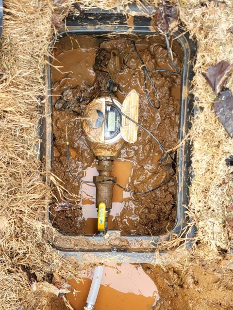 We responded to our customer in Dallas, GA after they reported a water leak near the water meter. We excavated around the meter box to access the leaking section of piping and completed the necessary repairs inside the meter box. After the repair, we restored water service and tested for leak free operation. Once confirmed, we backfilled and buried the area to complete the job. The leak has been successfully repaired and the water system is operating properly.