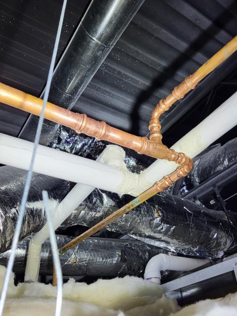 We responded to our customer in Woodstock, GA after they reported a water leak coming from the ceiling. Upon inspection, we located a leaking copper pipe in the ceiling. We cut out the damaged section and replaced it with new copper piping to restore a secure connection. Once the installation was completed, we tested the line for proper, leak free operation. The ceiling leak has been resolved and the plumbing system is functioning properly.