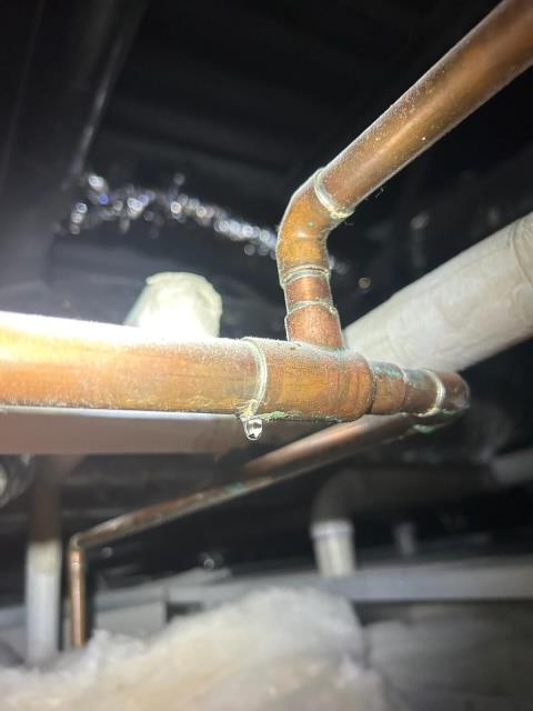 We responded to our customer in Woodstock, GA after they reported a water leak coming from the ceiling. Upon inspection, we located a leaking copper pipe in the ceiling. We cut out the damaged section and replaced it with new copper piping to restore a secure connection. Once the installation was completed, we tested the line for proper, leak free operation. The ceiling leak has been resolved and the plumbing system is functioning properly.