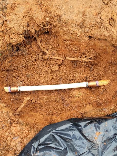 We responded to our customer in Temple, GA after they noticed a wet area in the yard indicating a possible water line leak. We excavated the area to locate the source and found a broken PVC water line underground. We repaired the damaged section of pipe to restore proper water flow. After completing the repair, we turned the water back on and tested for leak free operation. The yard leak has been resolved and the water system is functioning properly.