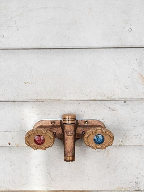 We responded to our customer in Marietta, GA to upgrade the existing garage spigots. We removed the two individual hose bibbs in the garage wall and installed a new dual spigot with hot and cold water outlets, allowing for hot, cold, or warm water use. All water line connections were properly secured during installation. Once the installation was completed, we tested the system for proper, leak free operation. The new dual hose bibb is now functioning correctly and ready for use.