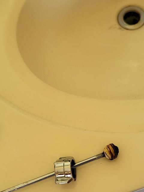 We responded to our customer in Powder Springs, GA after they reported the pop up lever was not working on the master bathroom sink. Upon inspection, we found the pop up assembly had come unattached on the right side. We reconnected and adjusted the pop up mechanism to restore proper function. After completing the repair, we ran water and tested for leak free operation and proper drainage. The sink is now functioning correctly.