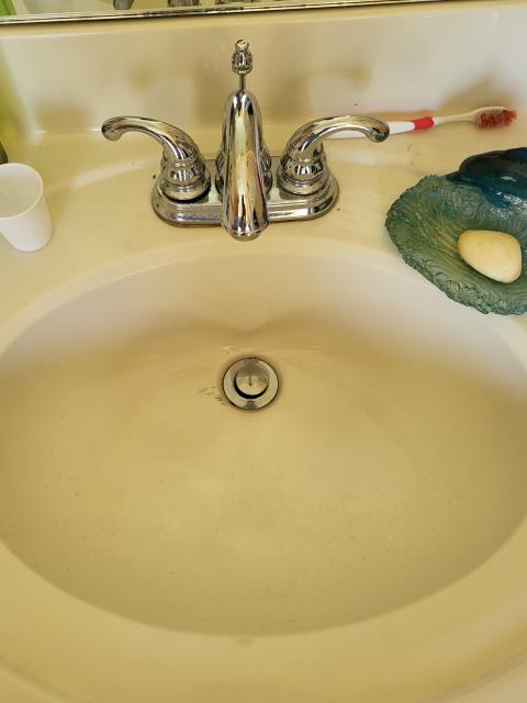 We responded to our customer in Powder Springs, GA after they reported the pop up lever was not working on the master bathroom sink. Upon inspection, we found the pop up assembly had come unattached on the right side. We reconnected and adjusted the pop up mechanism to restore proper function. After completing the repair, we ran water and tested for leak free operation and proper drainage. The sink is now functioning correctly.