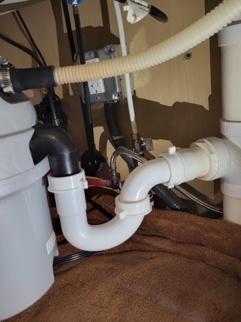 We responded to our customer in Marietta, GA after they reported a leak under the kitchen sink from the garbage disposal. Upon inspection, we found the disposal arm was broken, causing the leak inside the cabinet. We replaced the damaged component to restore a proper seal and function. After completing the repair, we ran water and tested for leak free operation. The garbage disposal is now functioning correctly with no leaks.